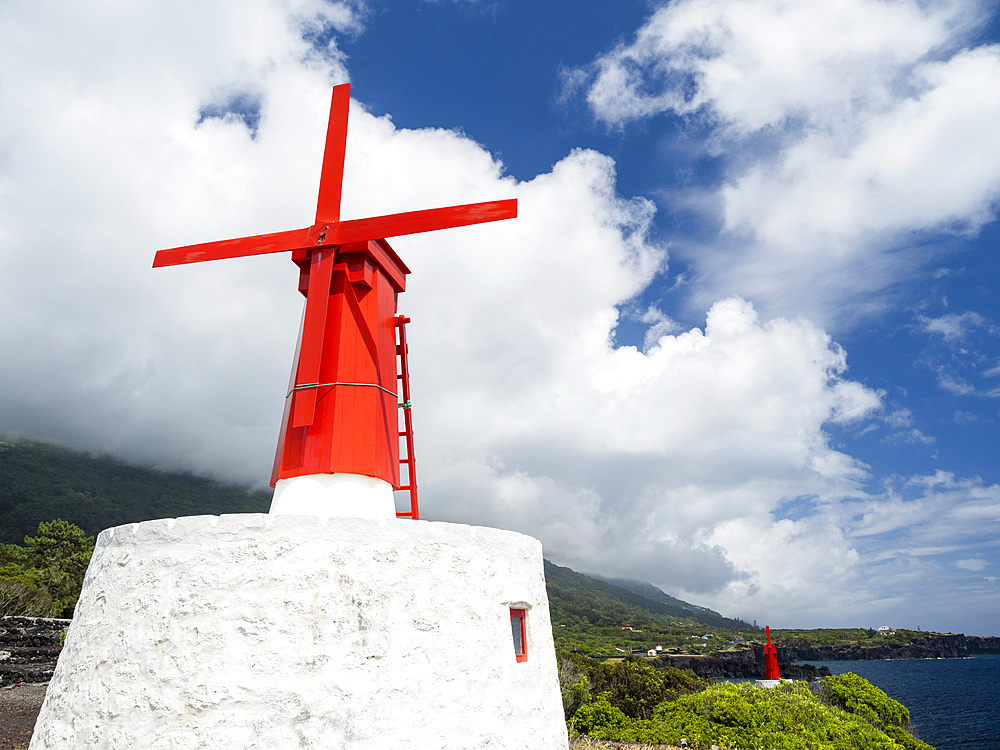 Village Urzelina, traditional windmills, Freguesia de Urzelina. Sao Jorge Island, an island in the Azores (Ilhas dos Acores) in the Atlantic ocean. The Azores are an autonomous region of Portugal. Europe, Portugal, Azores