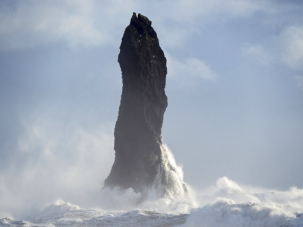 The coast of the north atlantic near Vik y Myrdal during winter.The sea stacks Reynisdrangar. Europe, Northern Europe, Scandinavia, Iceland, February