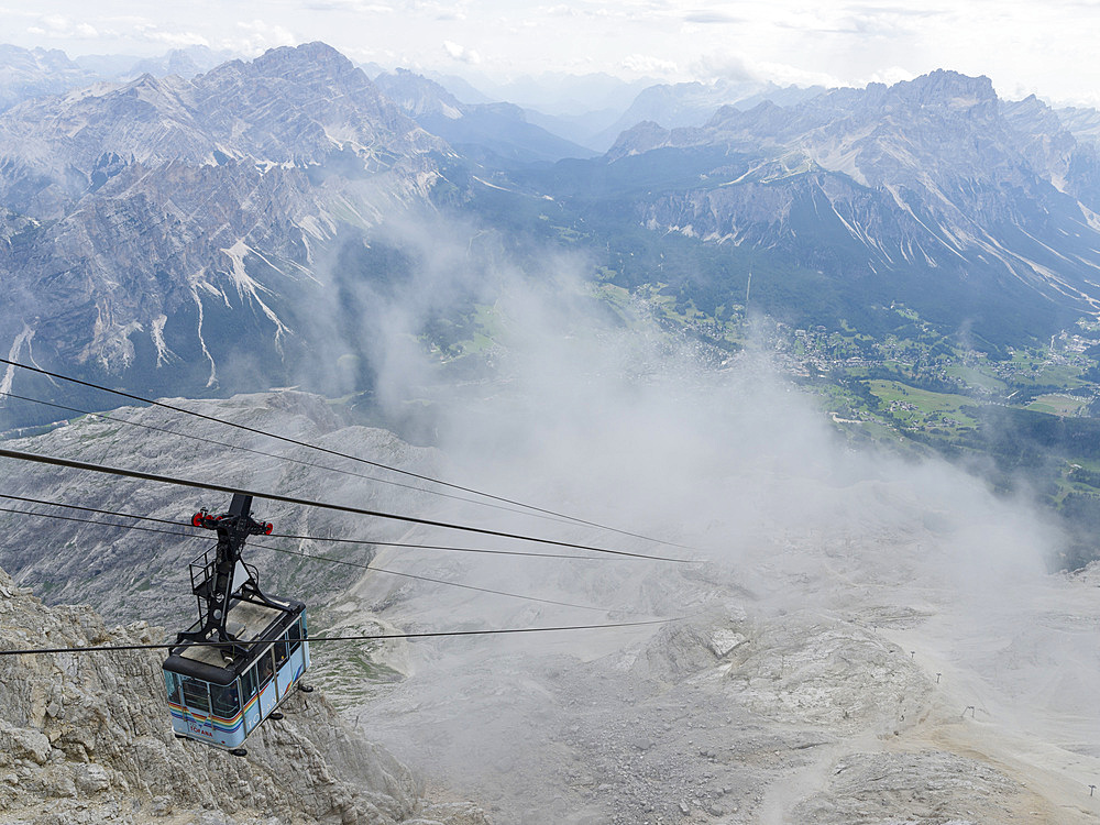 Cable car up to the Tofana di Mezzo in the dolomites of the Veneto near Cortina d'Ampezzo . The Tofane are part of the UNESCO world heritage the Dolomites. Europe, Central Europe, Italy