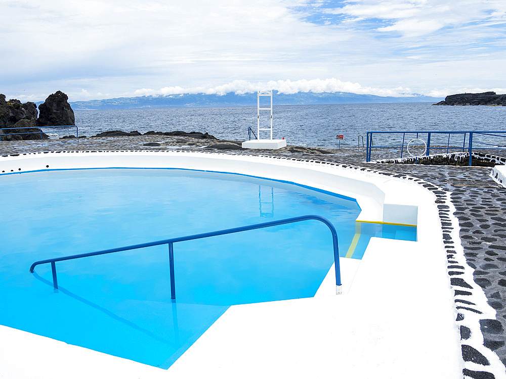 Beach and swimming pools at Furna de Santo Antonio. Pico Island, an island in the Azores (Ilhas dos Acores) in the Atlantic ocean. The Azores are an autonomous region of Portugal. Europe, Portugal, Azores