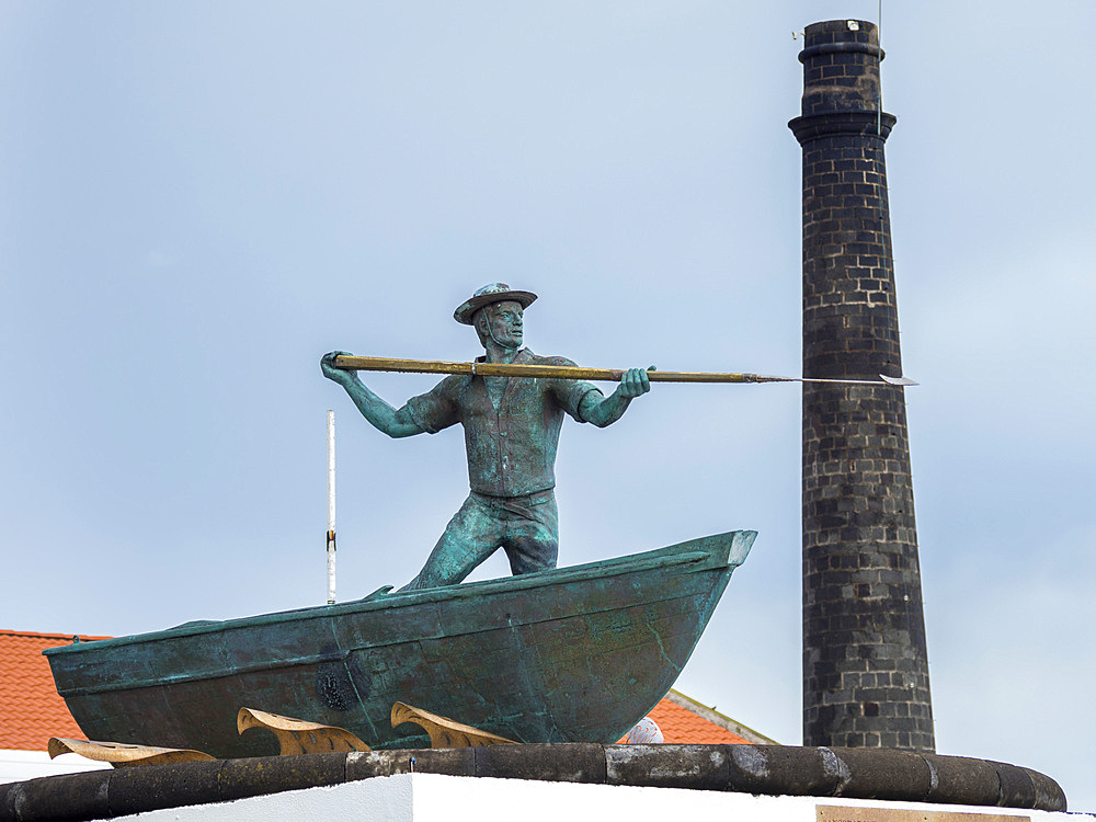 Monument commemorating the whalers of Pico in Sao Roque do Pico. Pico Island, an island in the Azores (Ilhas dos Acores) in the Atlantic ocean. The Azores are an autonomous region of Portugal. Europe, Portugal, Azores