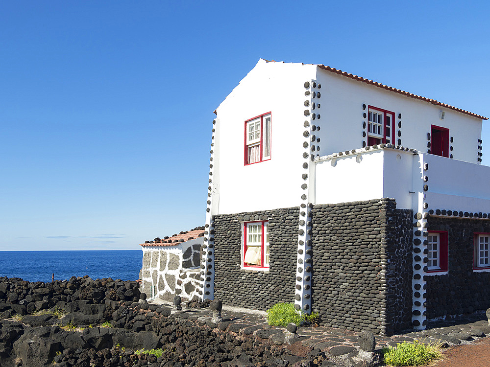 Village Lajido on the northern coast. Pico Island, an island in the Azores (Ilhas dos Acores) in the Atlantic ocean. The Azores are an autonomous region of Portugal. Europe, Portugal, Azores