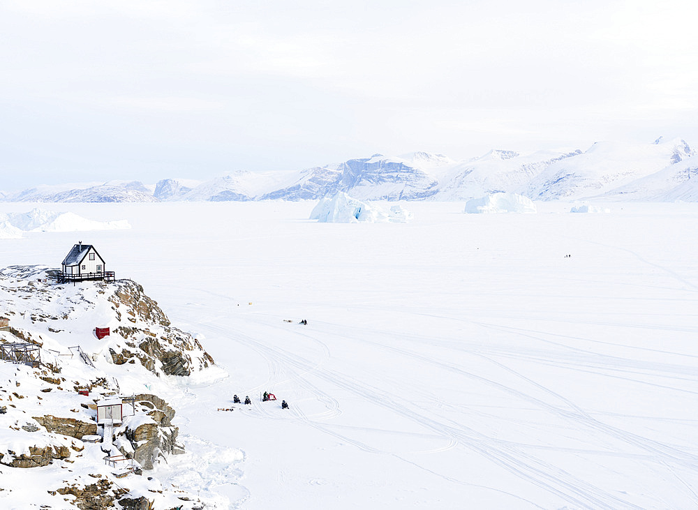 Town Uummannaq during winter in northern Greenland. Background is Nussuaq (Nugssuaq) peninsula. America, North America, Denmark, Greenland