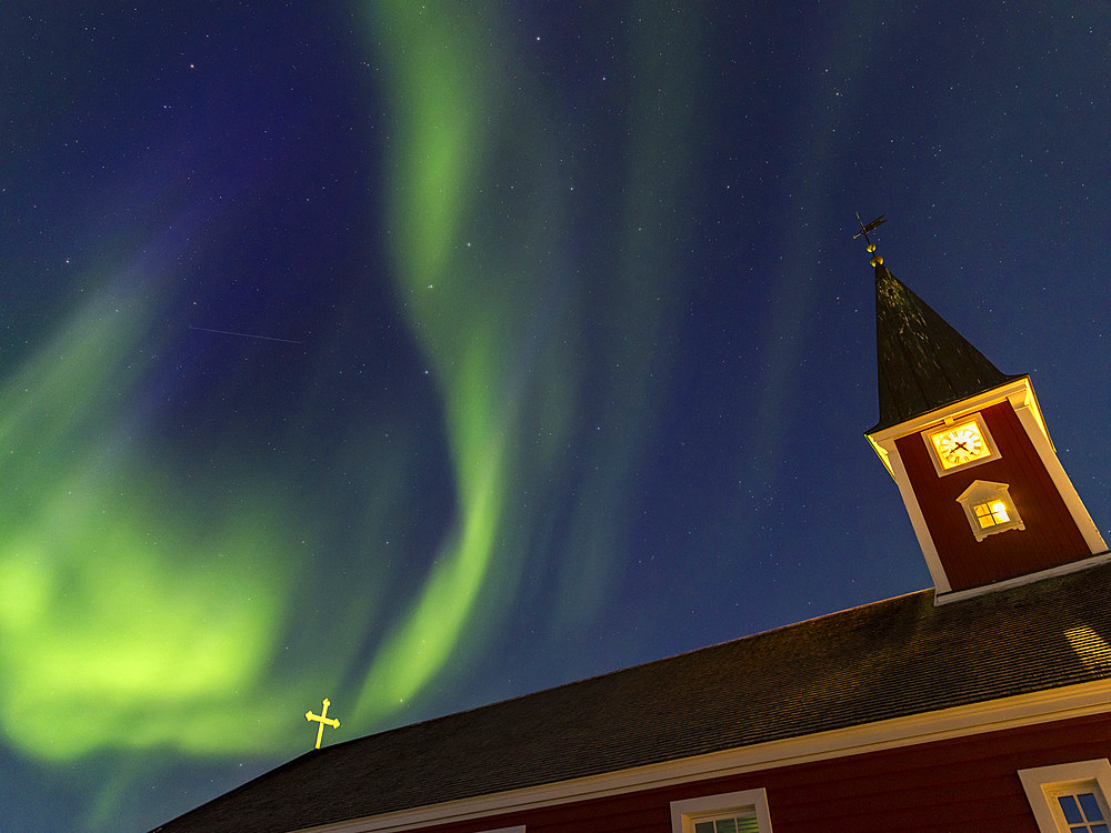 Northern lights over the Church of our saviour, the cathedral of Nuuk. The old town of Nuuk, the capital of Greenland. America, North America, Greenland