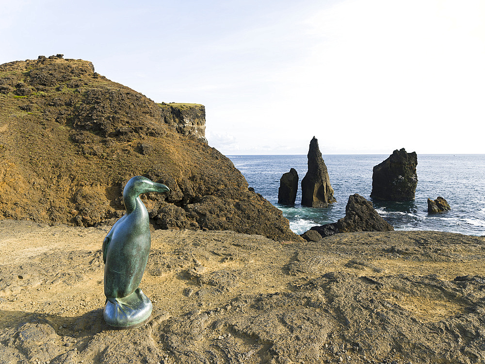 Monument for the extinct great auk (Pinguinus impennis), created by Todd McGrain. Coastal landscape at Reykjanesviti and Valahnukur on Reykjanes peninsula. europe, northern europe, iceland, august