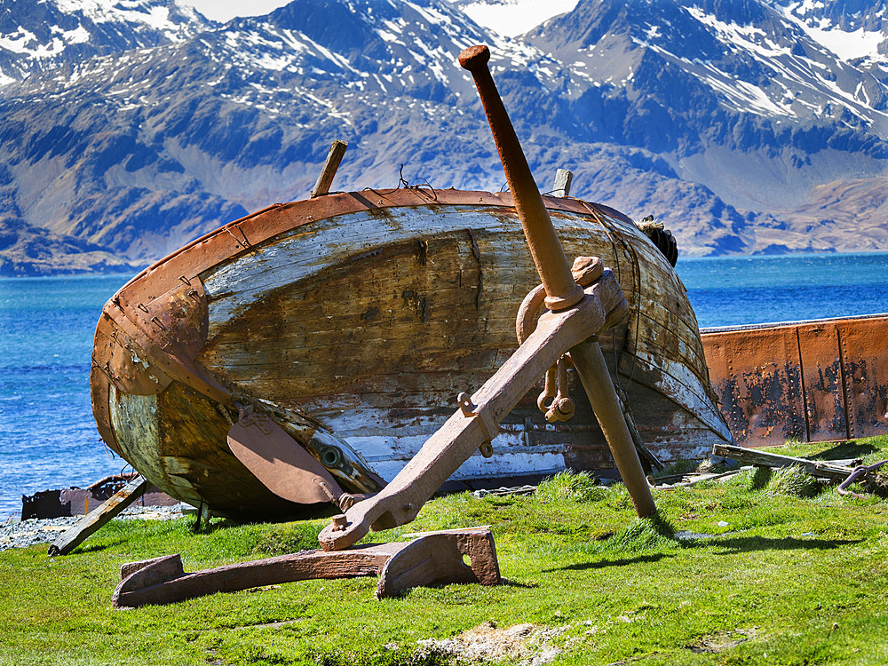 Wreck of a small ship. Grytviken Whaling Station in South Georgia. Grytviken is open to visitors, but most walls and roofs of the factory have been demolished for safety reasons. Antarctica, Subantarctica, South Georgia, October