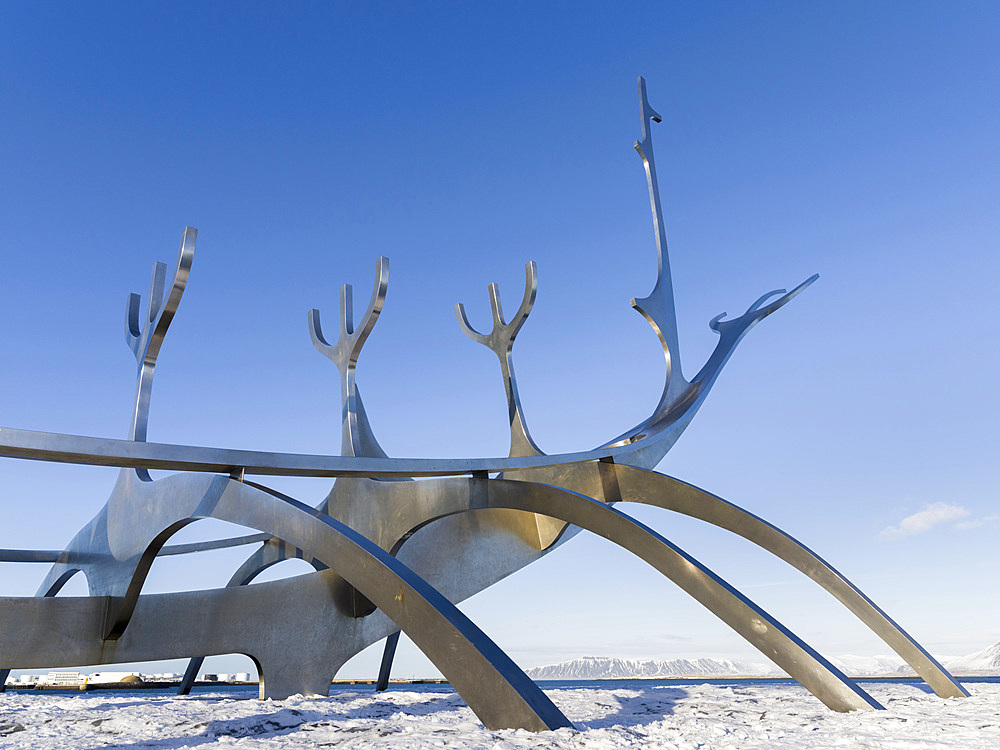 Solfar, a landmark of Reykjavik. Solfar icelandic for Sun Voyager is a sculpture made of stainless steel in the harbour of Reykjavik created by the artist Jon Gunnar Arnason. europe, northern europe, iceland, February