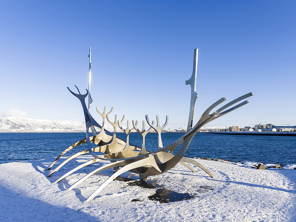 Solfar, a landmark of Reykjavik. Solfar icelandic for Sun Voyager is a sculpture made of stainless steel in the harbour of Reykjavik created by the artist Jon Gunnar Arnason. europe, northern europe, iceland, February