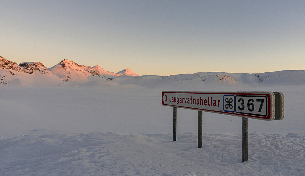 Lonely country road during sunrise in the snowy mountains of Iceland. europe, northern europe, iceland, February