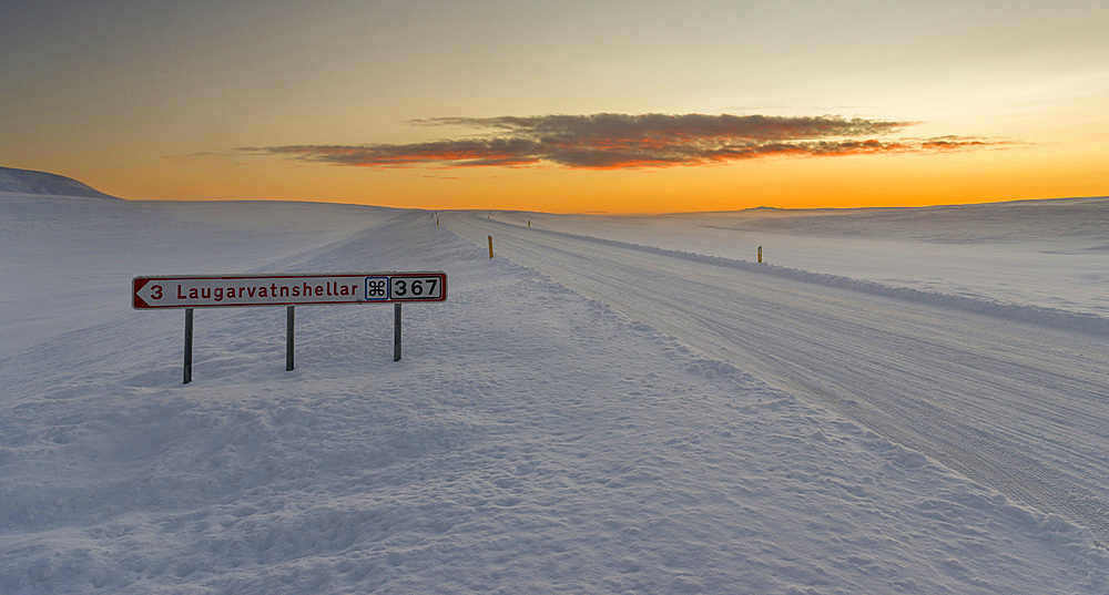 Lonely country road during sunrise in the snowy mountains of Iceland. europe, northern europe, iceland, February