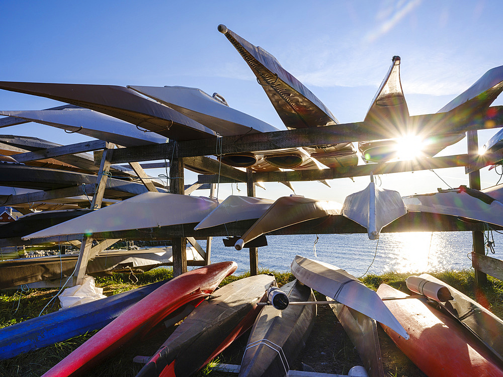 Kayaks of the local club in the old town at the colonial harbour. Nuuk the capital of Greenland during late autumn. America, North America, Greenland, danish terriotory