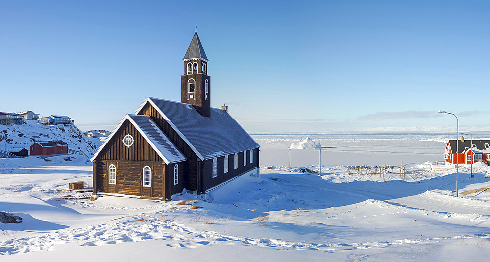 Zions Church, a landmark of Ilulissat. Winter in Ilulissat on the shore of Disko Bay. America, North America, Greenland, Denmark