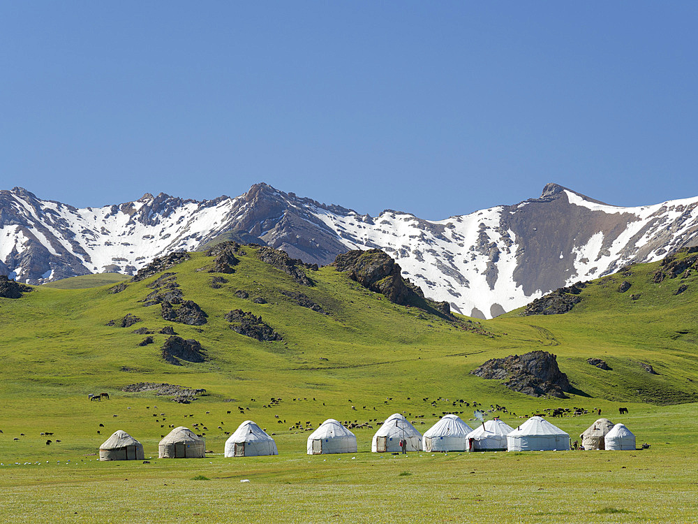 Yurts for tourists at lake Song Kol (Son Kul, Songkoel, Song-Koel). Tien Shan mountains or heavenly mountains in Kirghizia. Asia, central Asia, Kyrgyzstan