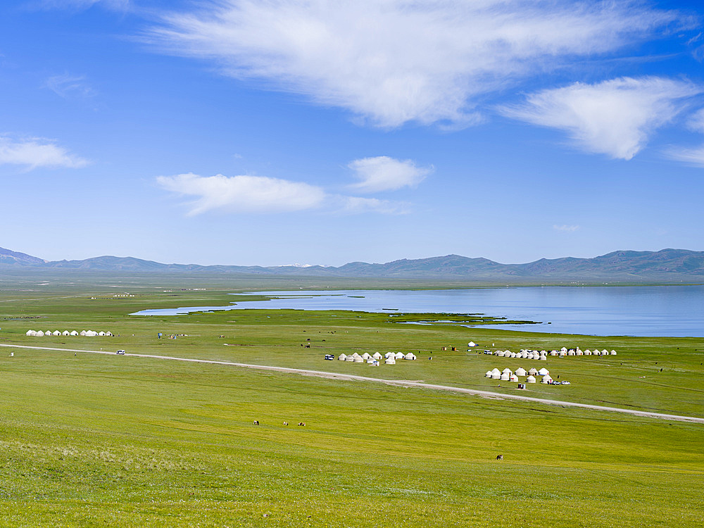 Yurts for tourists at lake Song Kol (Son Kul, Songkoel, Song-Koel). Tien Shan mountains or heavenly mountains in Kirghizia. Asia, central Asia, Kyrgyzstan