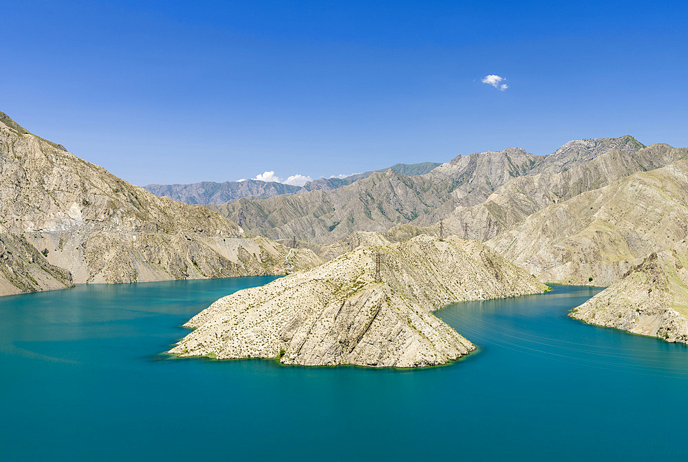 Landscape along the Tien Shan Highway, the Kurpsai Reservoir, at river Naryn in the Tien Shan or heavenly mountains. Asia, Central Asia, Kyrgyzstan