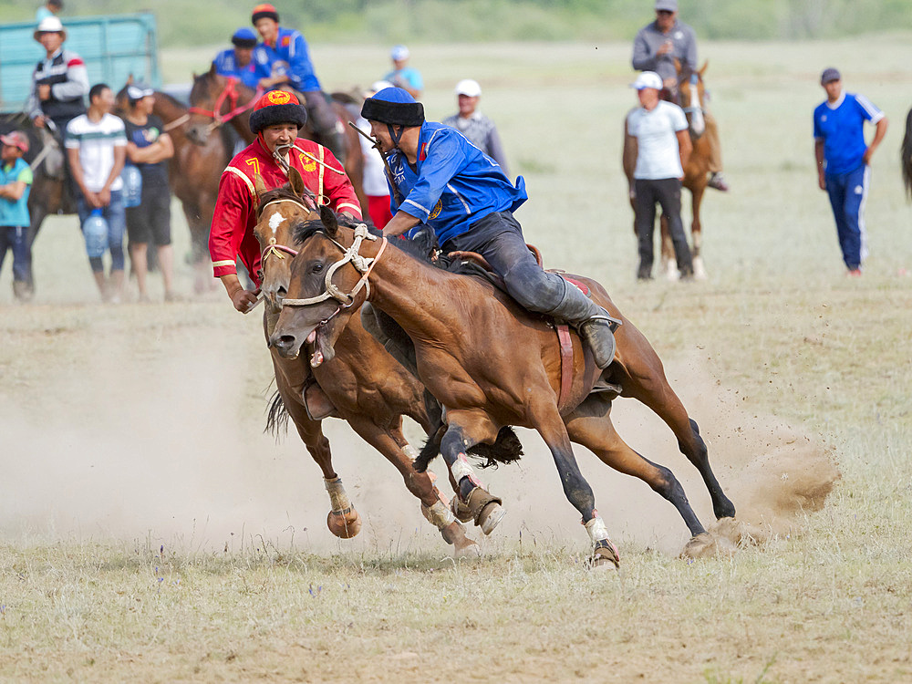 Kok Boru (Buzkashi), traditional equestrian team sport. Festival on the Suusamyr plain commemorating Mr Koshkomul, a sportsman and folk hero of the last century. Kok Boru is listed as UNESCO Intangible Cultural Heritage Asia, central asia, Kyrgyzstan