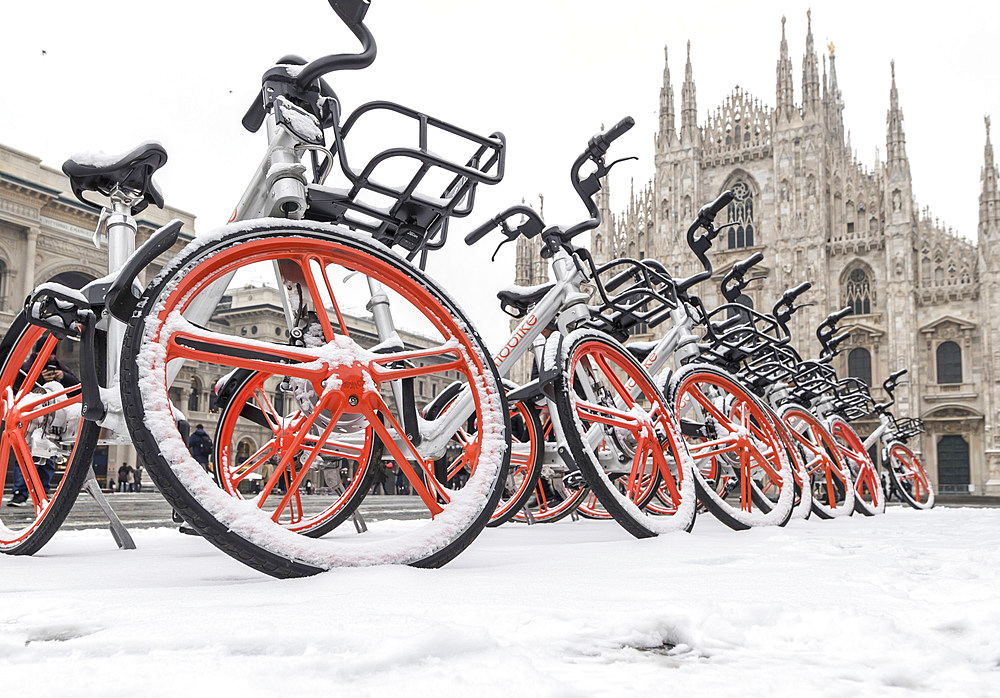 Piazza del Duomo square covered with snow during the meteorological phenomenon called Burian, Milan, Lombardy, Italy, Europe