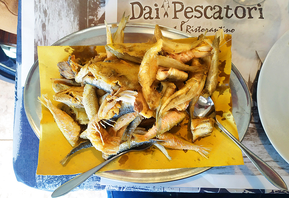 Typical fried fish called fritto di paranza, small fish, Porto Recanati, Marche, Italy, Europe