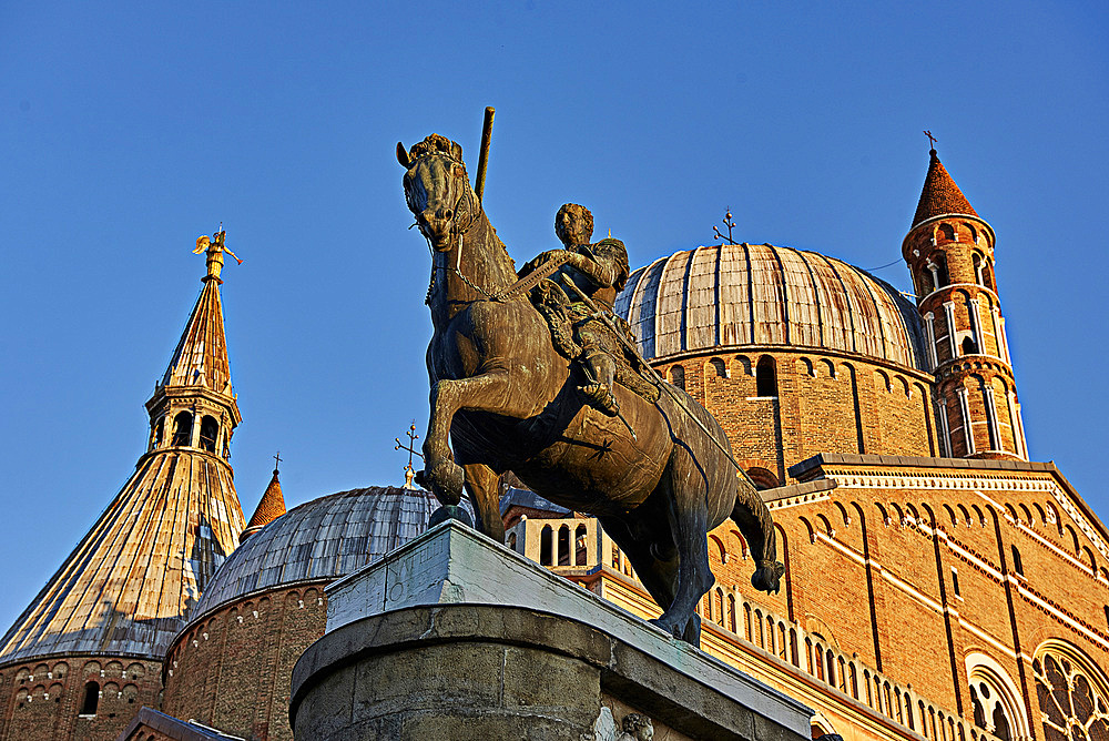 View of statue in Saint Anthony Square and Saint Anthony of Padua Basilica, Padua, Veneto, Italy, Europe