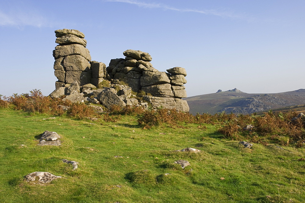 A rock outcrop on Hound Tor with Haytor Rocks on the skyline, Dartmoor National Park, Devon, England, United Kingdom, Europe