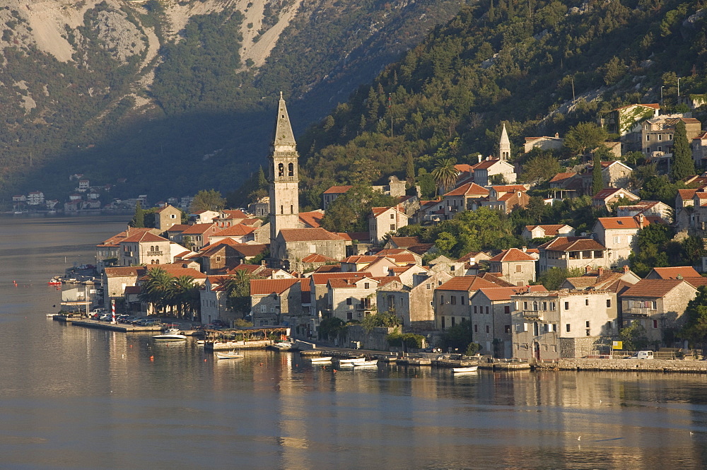 A small town on the fjord approaching Kotor, Montenegro, Europe 