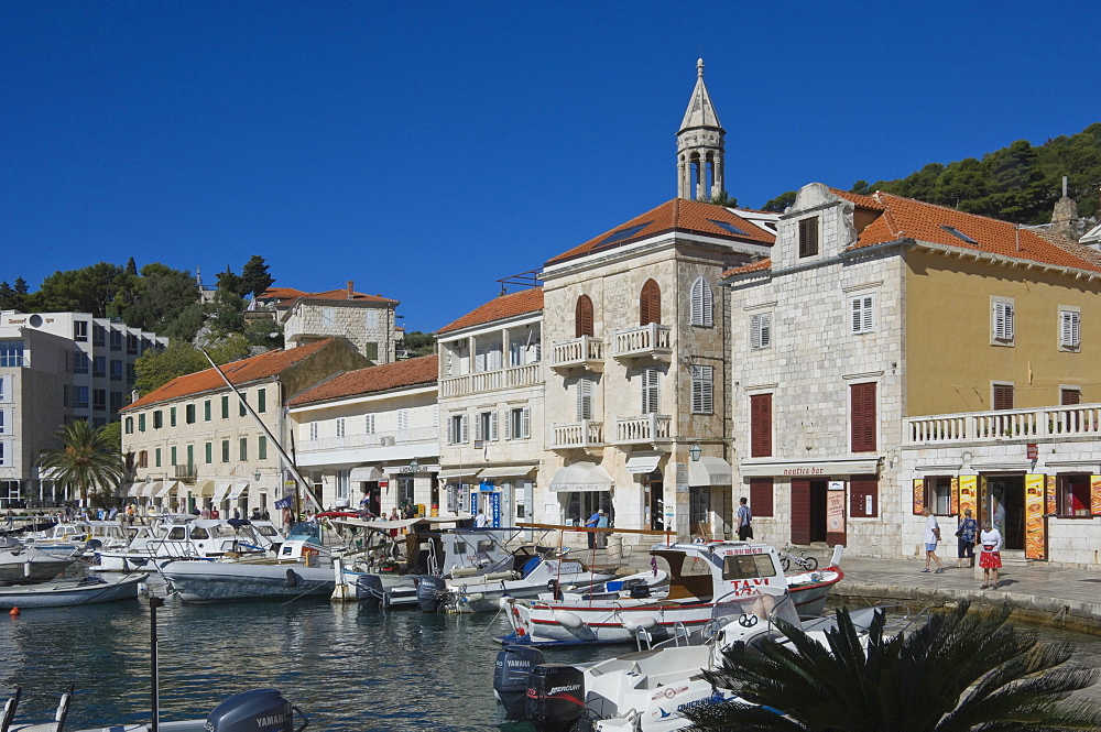 Promenade cafes by the old harbour in the medieval city of Hvar, on the island of Hvar, Dalmatia, Croatia, Europe 