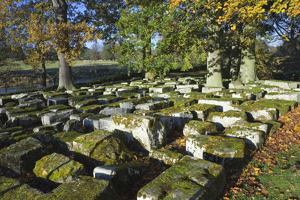 Large wrought stones recovered from the site of the Roman Bridge that spanned the River North Tyne dating from AD 138, Cilurnum (Chesters Roman Fort), Hadrian's Wall, UNESCO World Heritage Site, Chollerford, Northumbria National Park, England, United Kingdom, Europe