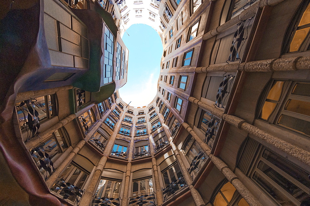 Interior fish eye view of La Pedrera (Casa Mila), an apartment block designed by Antonio Gaudi, UNESCO World Heritage Site, Passeig de Gracia, Barcelona, Catalunya, Spain, Europe 