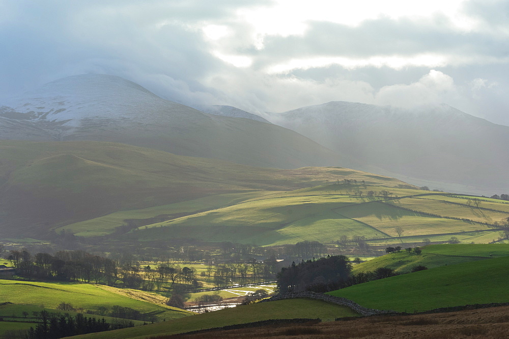 Farming village in a sheltered valley on the fell above Caldbeck, John Peel Country, Back o'Skiddaw, Cumbria, England, United Kingdom, Europe