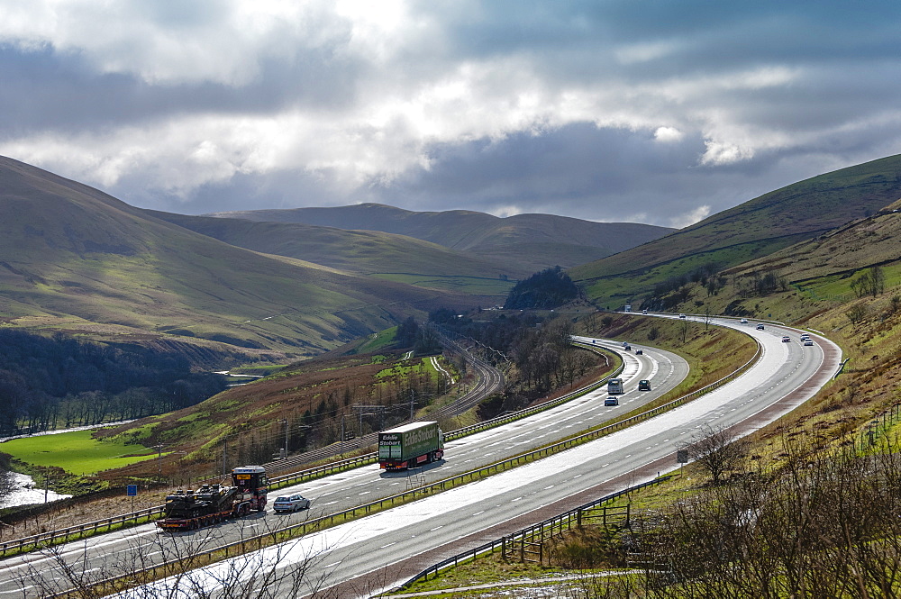 M6 Motorway cutting through the Lune Valley near Tebay, Cumbria, England, United Kingdom, Europe