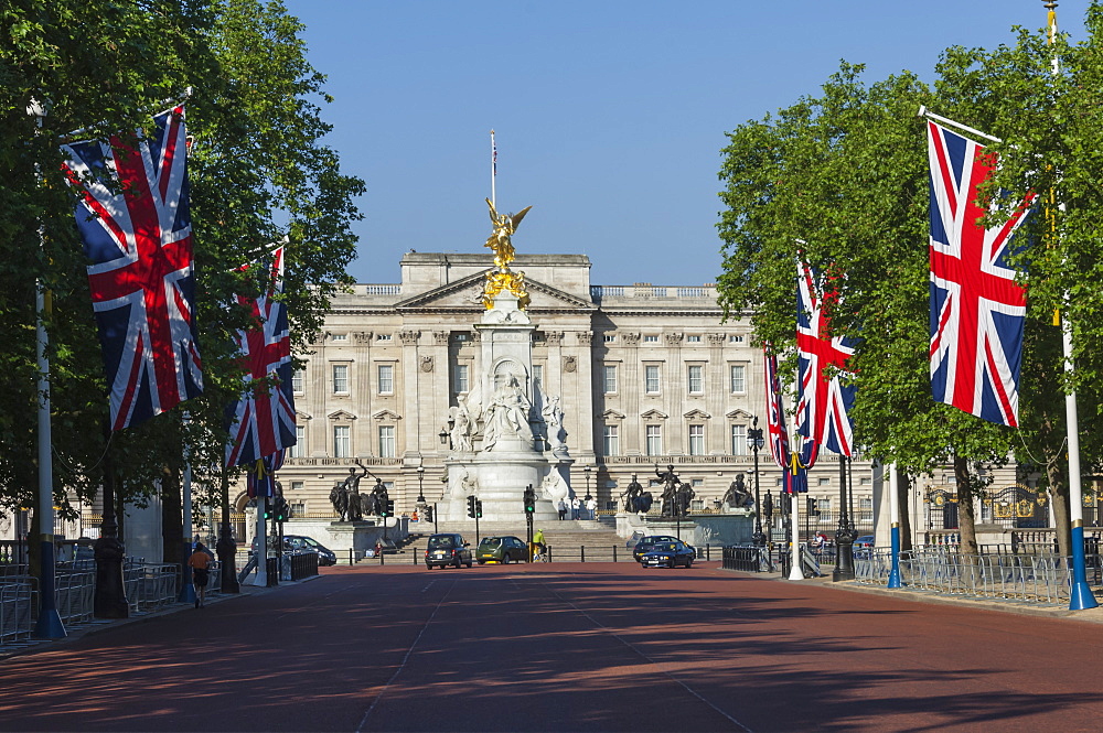 Buckingham Palace down the Mall with Union Jack flags, London, England, United Kingdom, Europe