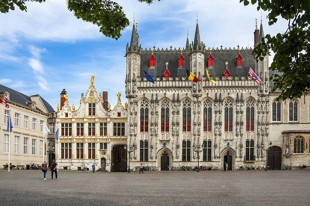 The 14th century Stadhuis (City Hall), National Flags, Burg Square, Brugge, UNESCO World Heritage Site, West Flanders, Belgium, Europe