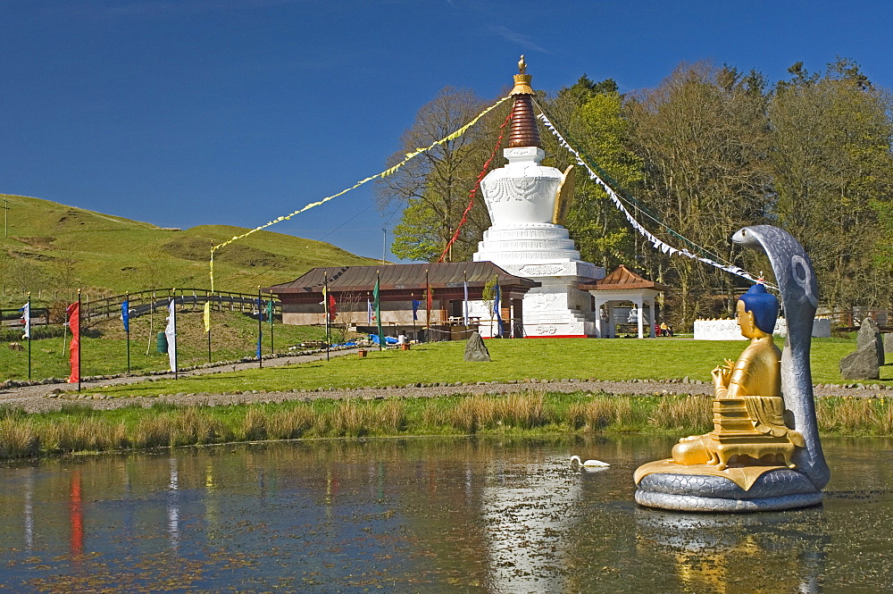 The Shrine Pond with cobra canopy prayer flags and stupa, Kagyu Samye Ling Monastery and Tibetan Centre, Eskdalemuir, Dumfries and Galloway, Scotland, United Kingdom, Europe