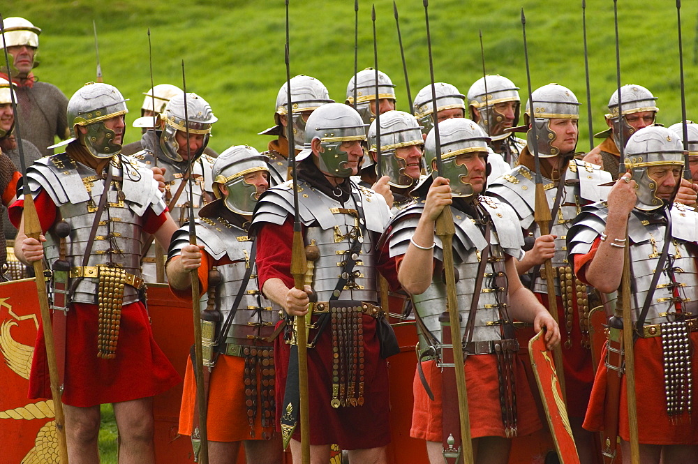 Ermine Street Guard in armour, at ease, Birdoswald Roman Fort, Hadrians Wall, Northumbria, England, United Kingdom, Euruope