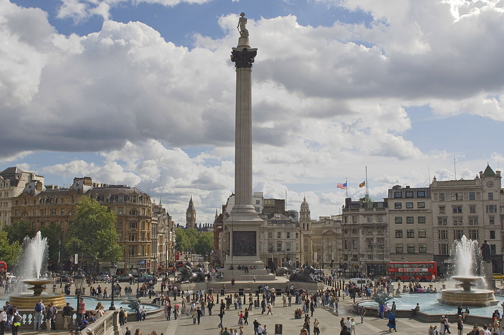 Nelsons Column in Trafalgar Square, with Big Ben in distance, London, England, United Kingdom, Europe