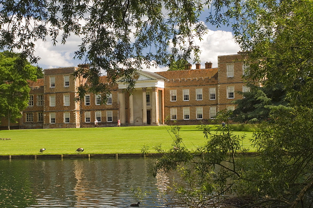 View across the lake to The Vyne, the 16th century home of William Sandys, Lord Chancellor to Henry VIII, Sherborne St. John, Hampshire, England, United Kingdom, Europe