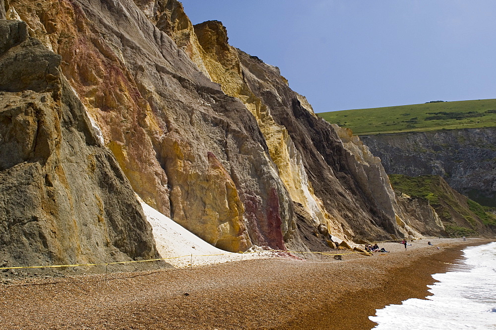 The beach and multi-coloured cliffs at Alum Bay, Isle of Wight, Hampshire, England, United Kingdom, Europe