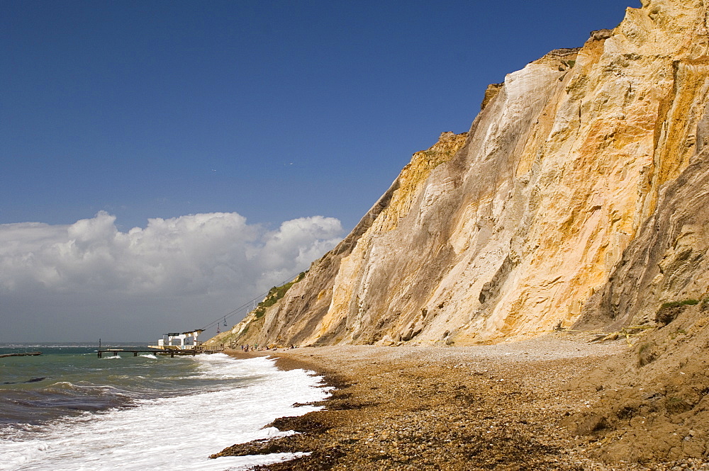 The beach and multi-coloured cliffs at Alum Bay, accessible by chairlift, Isle of Wight, Hampshire, England, United Kingdom, Europe