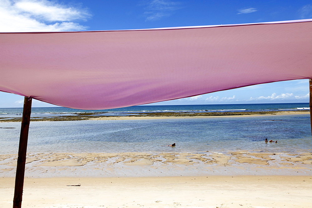 People swimming at Parracho Beach, Arraial d'Ajuda, Bahia, Brazil, South America 