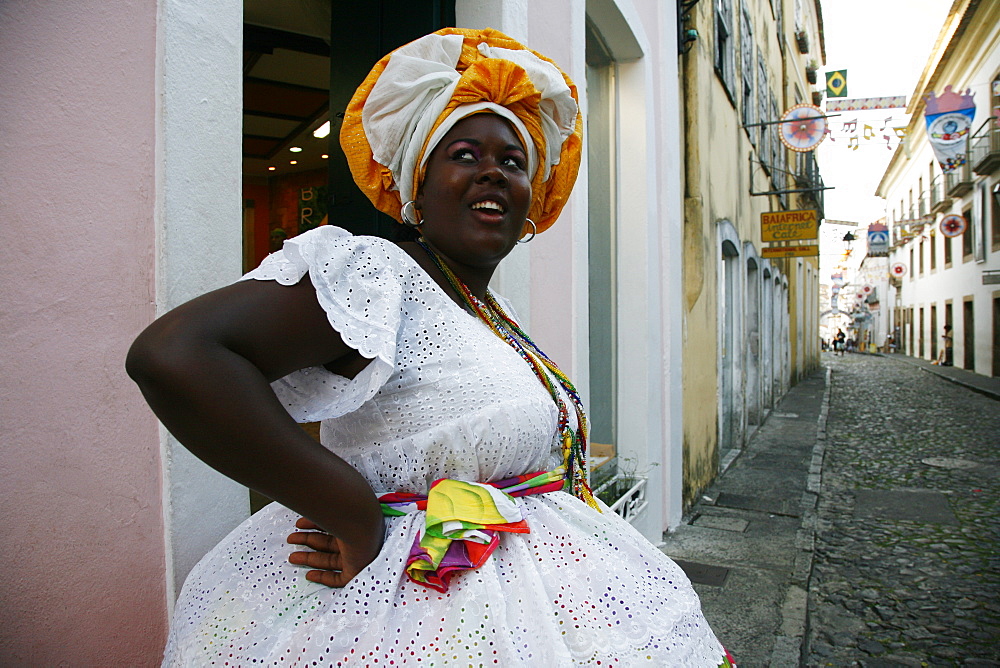 Bahian woman in traditional dress at the Pelourinho district, Salvador, Bahia, Brazil, South America