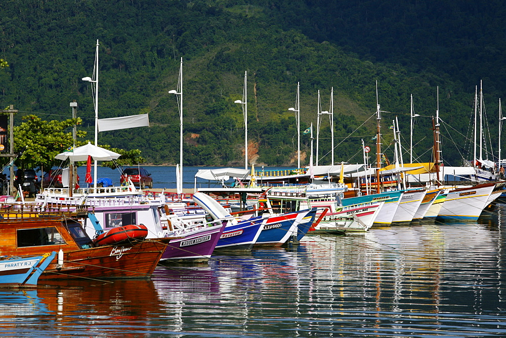 Colorful fishing boats in the harbour, Paraty (Parati), Rio de Janeiro State, Brazil, South America