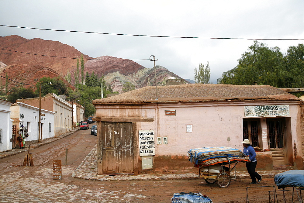 Street scene in Purmamarca with the Mountain of Seven Colors in the background, Purmamarca, Quebrada de Humahuaca, UNESCO World Heritage Site, Jujuy Province, Argentina, South America 