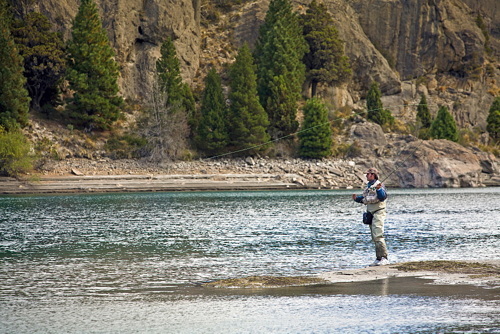 Fly fishing at the Limay River in the lake district, Patagonia, Argentina, South America