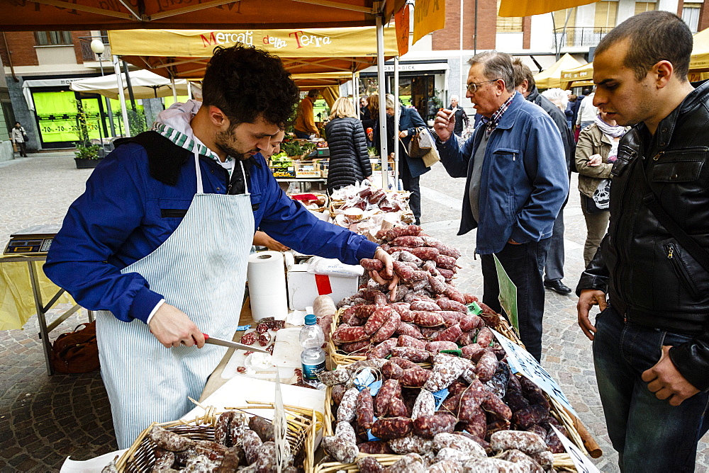 Salami stall at a market in Alba, Langhe, Cueno, Piedmont, Italy, Europe