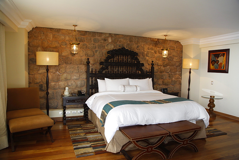 Monastery wall at a room in the Marriott Hotel, Cuzco, Peru, South America