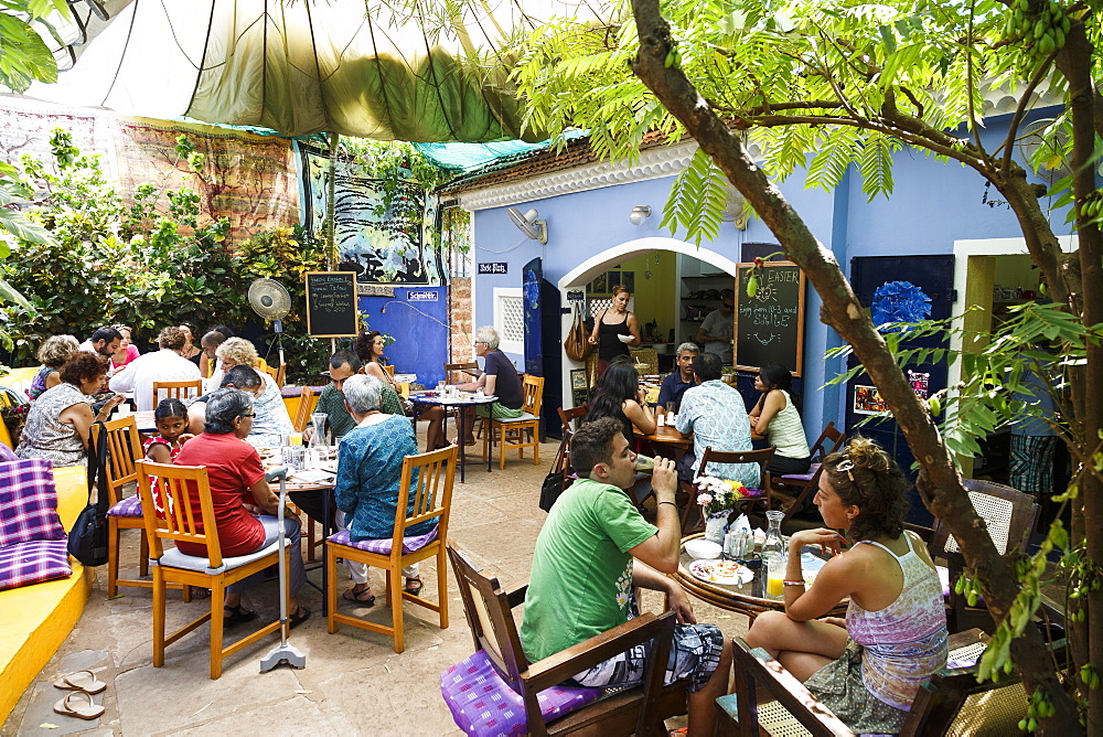 People sitting at the Villa Blanche Bistro, Assagao, Goa, India, Asia