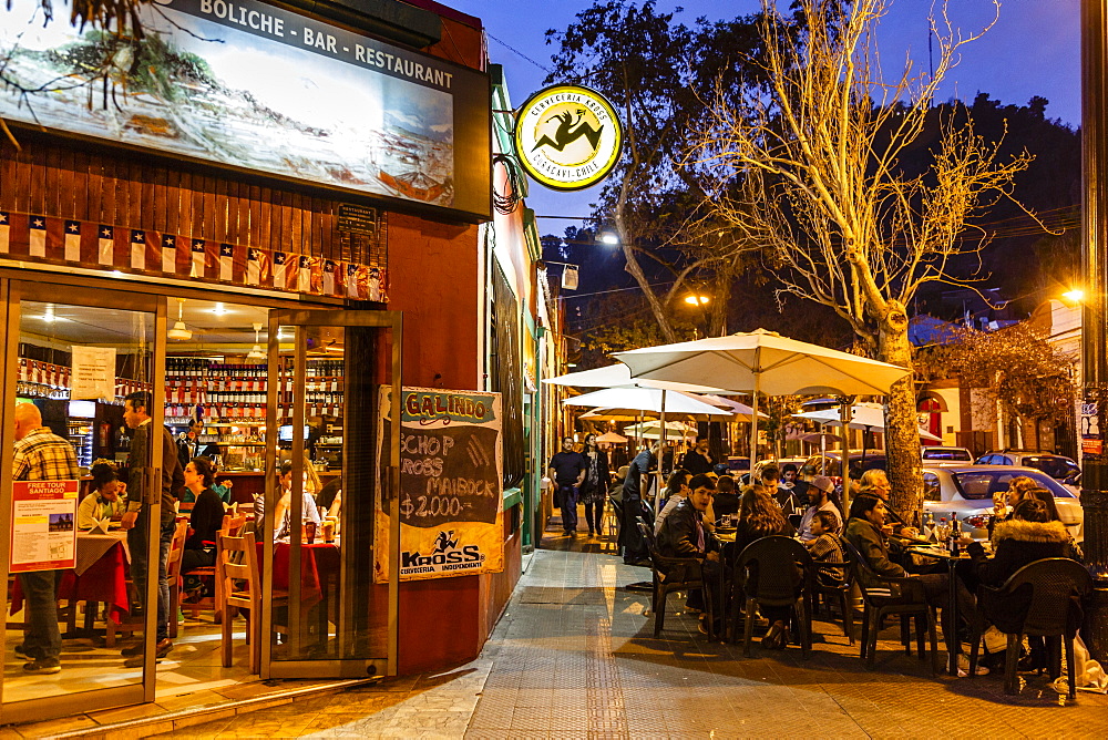 People sitting at a restaurant in Bellavista neighbourhood, Santiago, Chile, South America