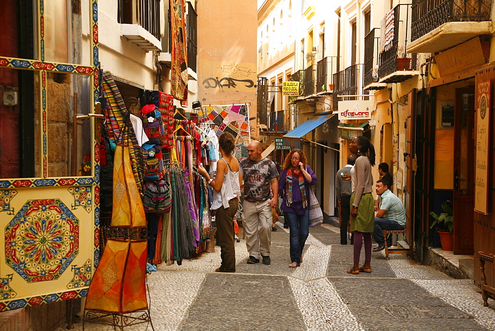 Calderia Nueva street in Albayzin, lined with North African style shops and tea houses, Granada, Andalucia, Spain, Europe