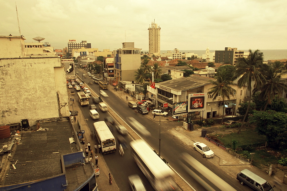 Traffic in Colombo beneath monsoon skies, Sri Lanka, Asia