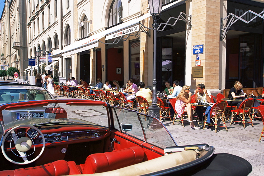 People sitting outside Cafe Roma on Maximilianstrasse, Munich, Bavaria, Germany, Europe